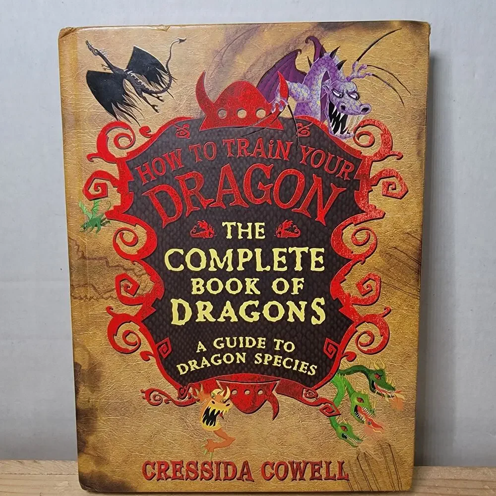 BOOK How To Train Your Dragon: The Complete Book Of Dragons (hardback)